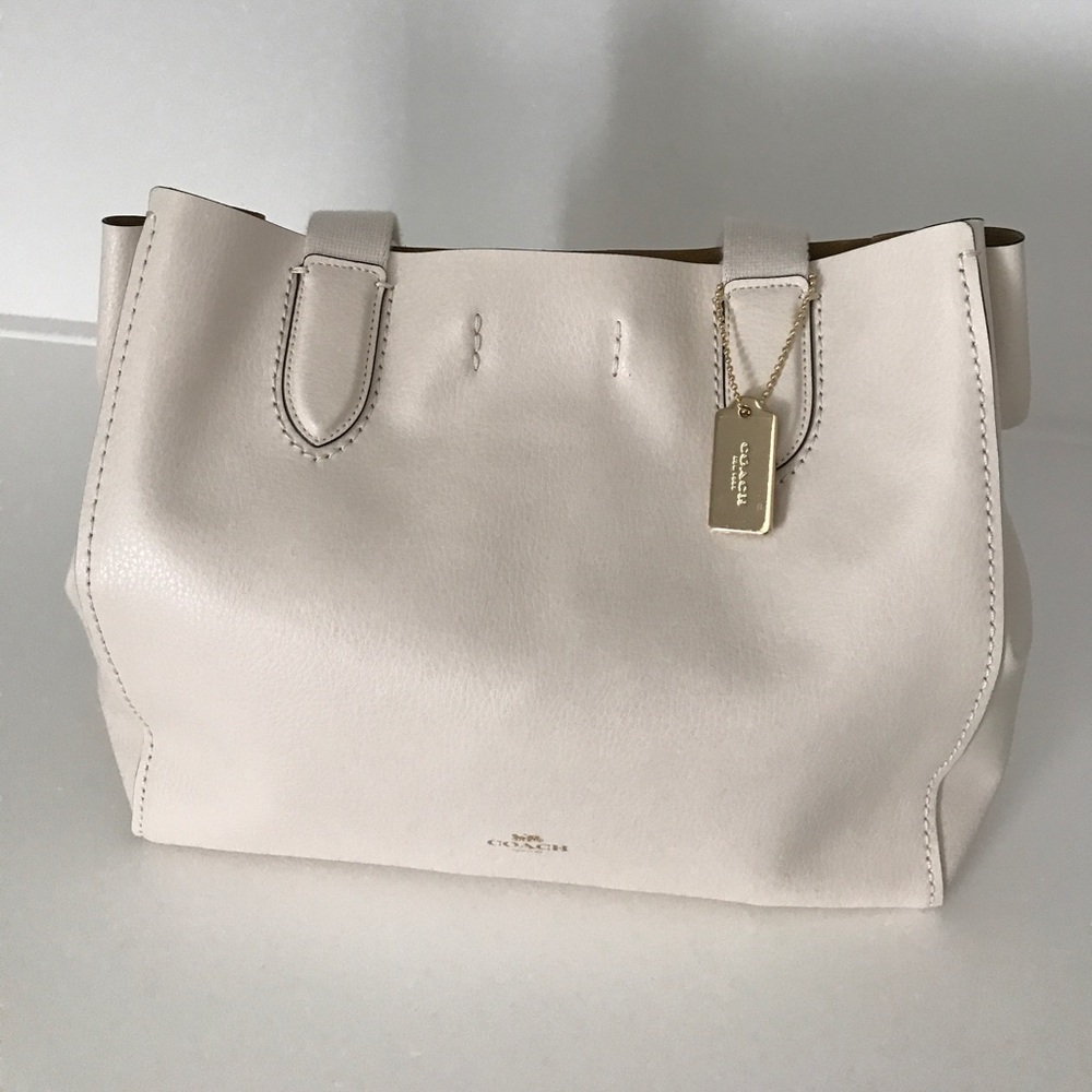 NWT: Coach